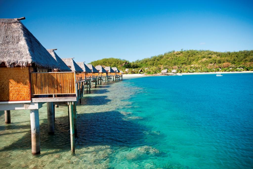 Likuliku Lagoon Resort Fiji Accommodation Over Water Bures On Reef Edge