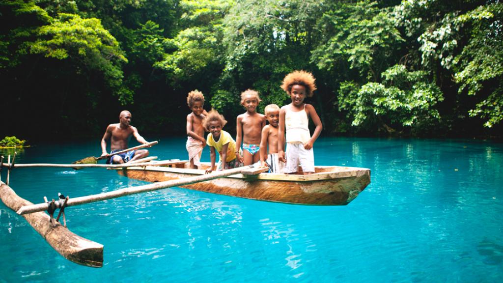 Kids in Canoe Blue Hole Santo