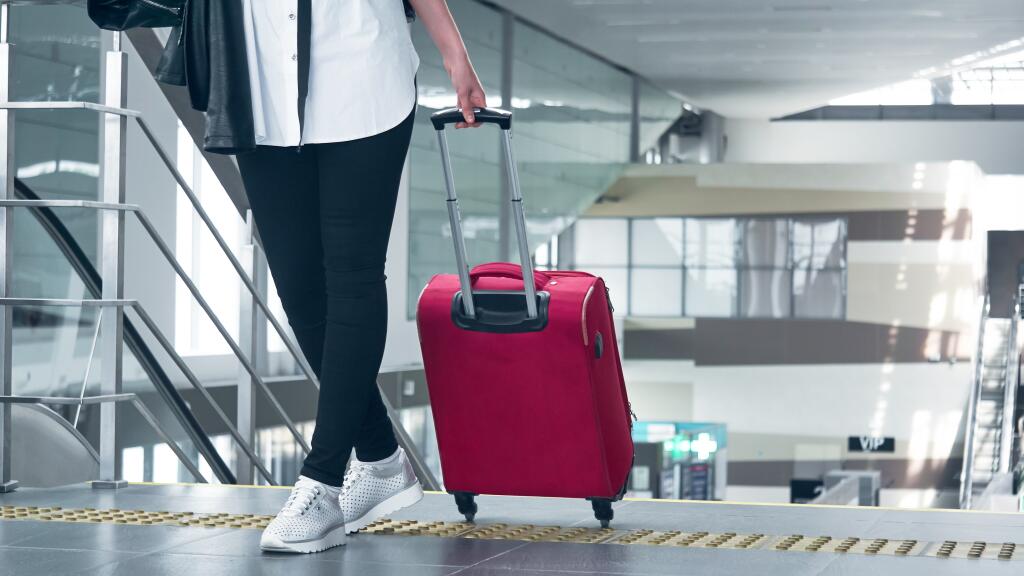 Suitcase Through Airport