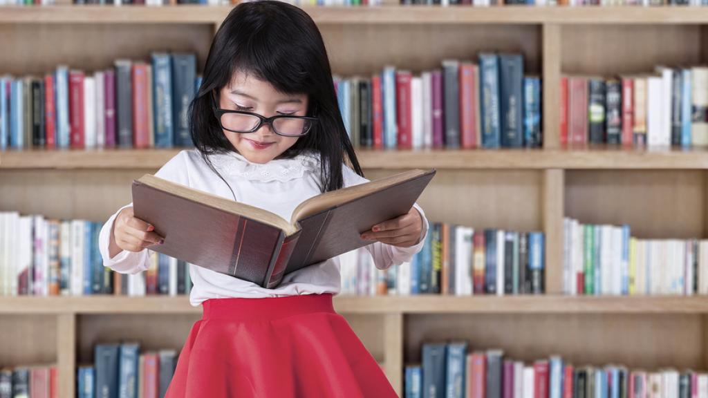 Generic Stock Images - Reading in Library