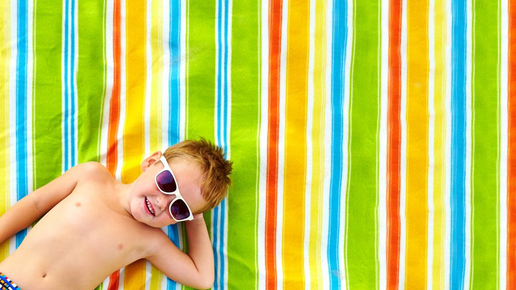 Kid Sunbathing Family