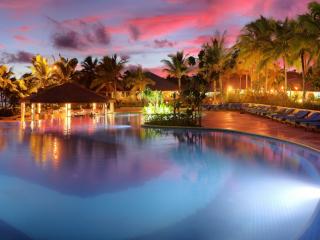 Warwick Le Lagon Resort & Spa - Pool at Sunset