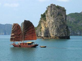 Junk Boat Sailing past Ha Long Bay